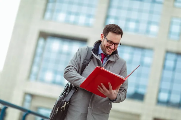 Young Attractive Businessman Holding Documents Papers Young Concentrated Man Reading — Stock Photo, Image