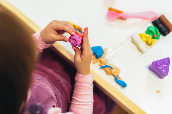 Kid Girl Playing Plasticine While Sitting Table Nursery Room — Stock Photo, Image