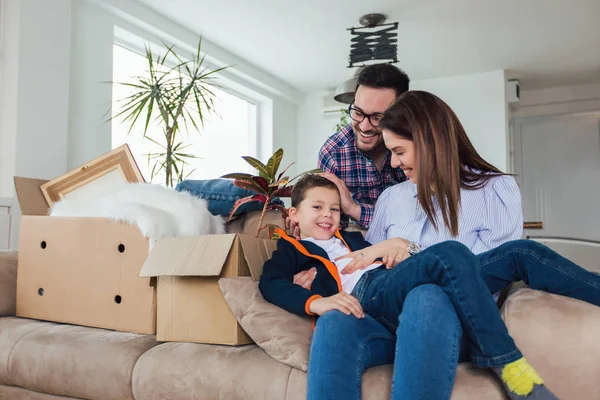 Happy Family Moving Home Boxes Having Fun — Stock Photo, Image