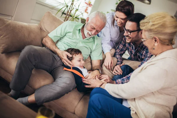 Portrait of a three generation family spending time together at — Stock Photo, Image