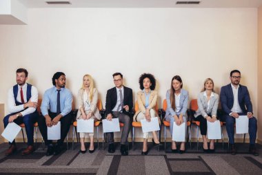Photo of candidates waiting for a job interview. Selective focus clipart