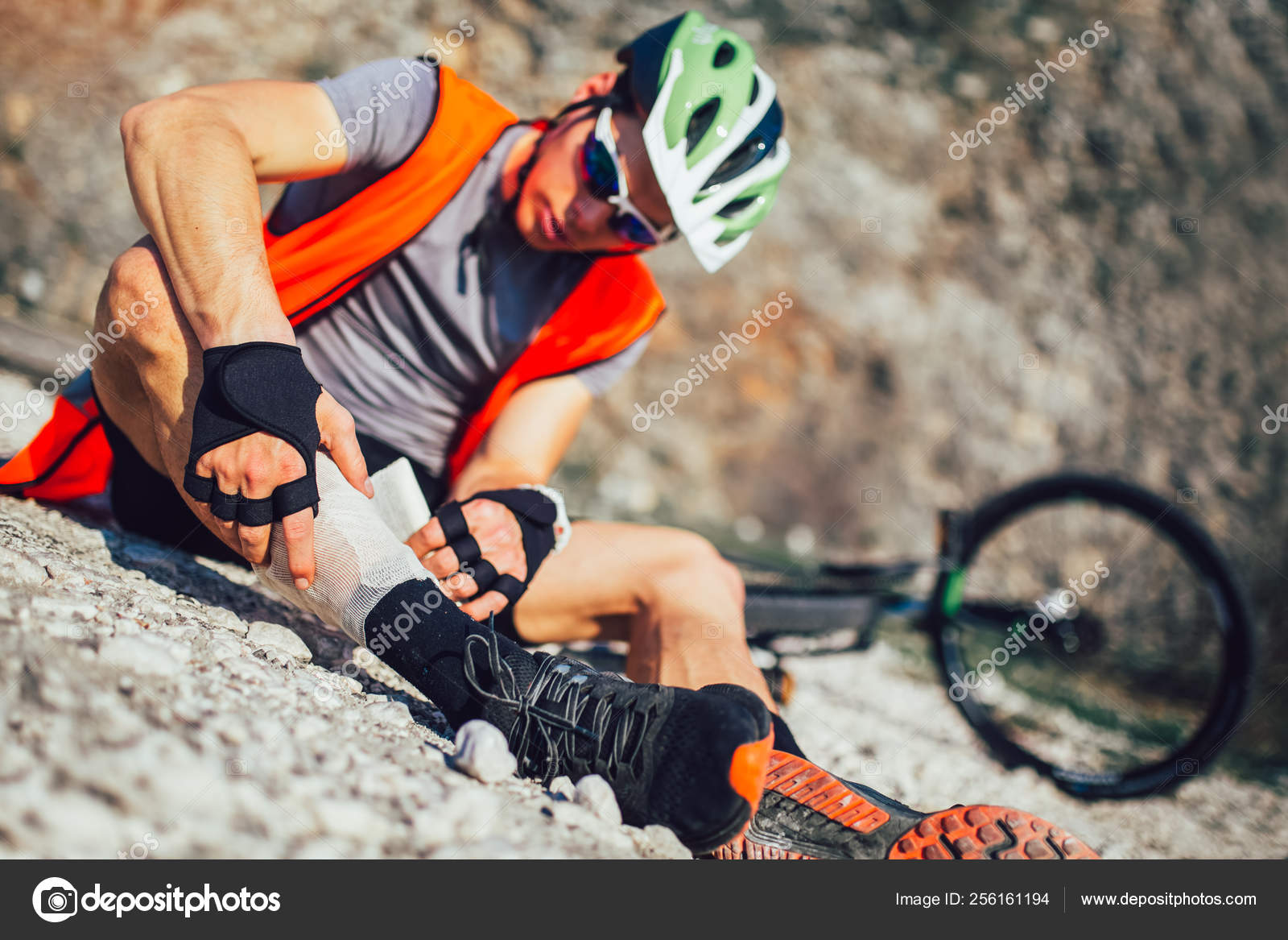 The Biker Fell From A Bike Using A Bandage From His First Aid K Stock Photo By C Adriaticphoto