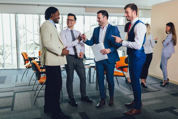 Young and successful business team in office. Selective focus. — Stock Photo, Image