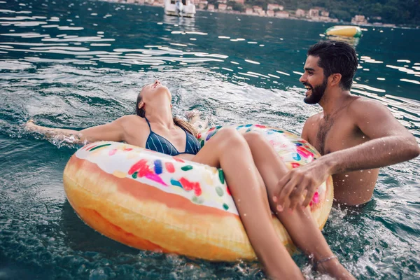 Happy couple resting at sea resort