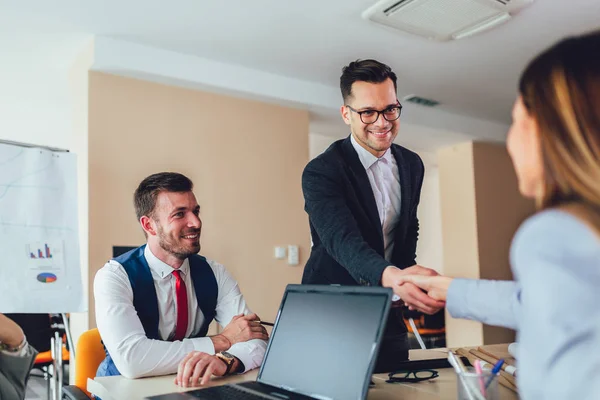 Business shaking hand with a client in office — Stock Photo, Image