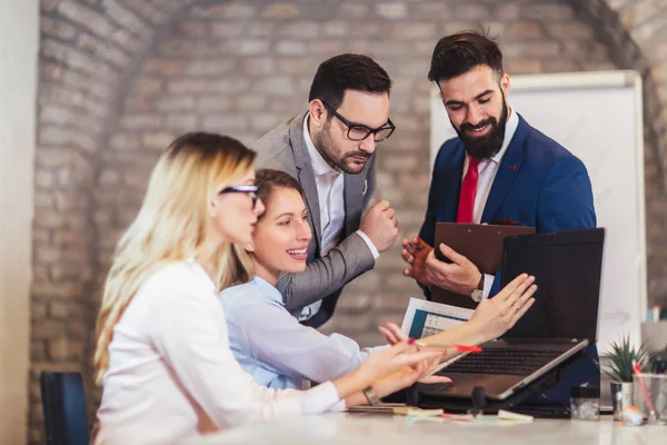 Business colleagues working on laptop in modern office. — Stock Photo, Image