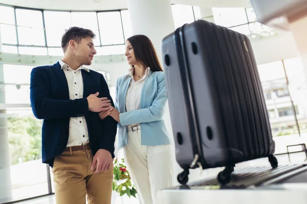 Business travelers put baggage on X-ray machine try to detection