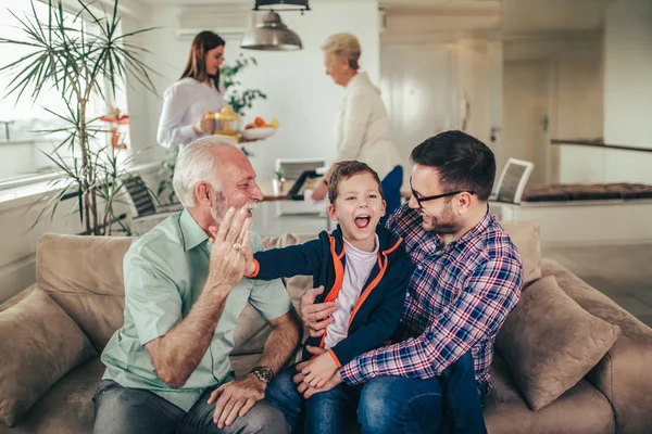 Portrait of a three generation family spending time together at — Stock Photo, Image