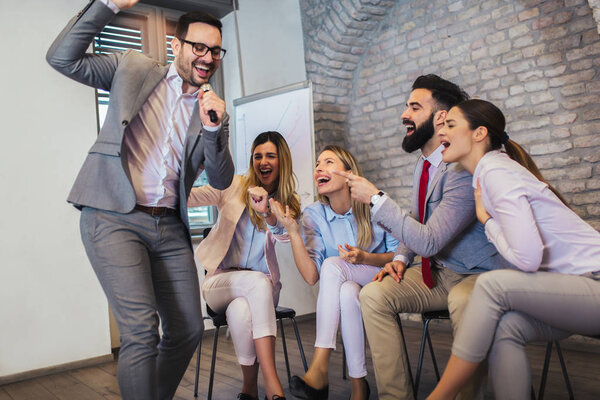 Business people making team training exercise during team buildi