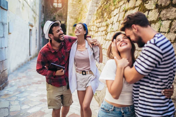 Happy group of tourists traveling and sightseeing