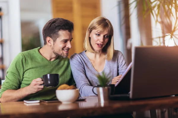 Couple sitting at the desk at home read notice paper check bills — Stock Photo, Image