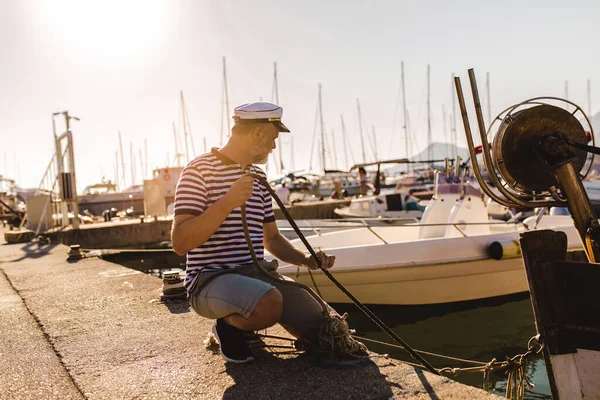 Mature Man Pier Dressed Sailor Shirt Hat Holding Sailor Rope — Stock Photo, Image