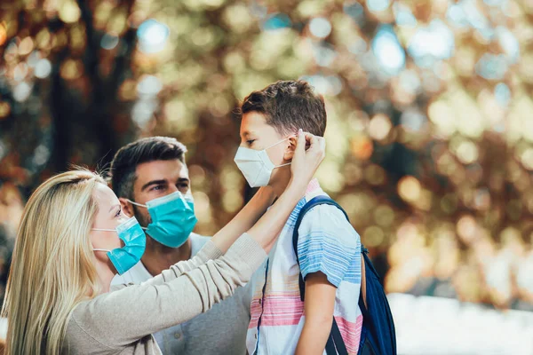 Mother Puts Safety Mask Her Son Face Schoolboy Ready School — Stock Photo, Image