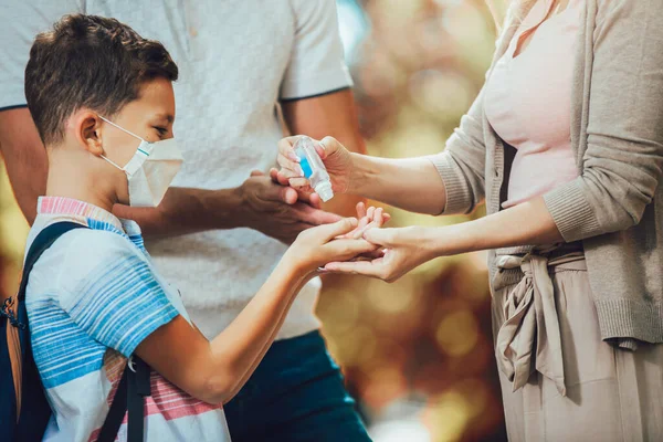 Mother Using Antiseptic Gel Disinfect Boys Hand Viral Bacteria — Stock Photo, Image