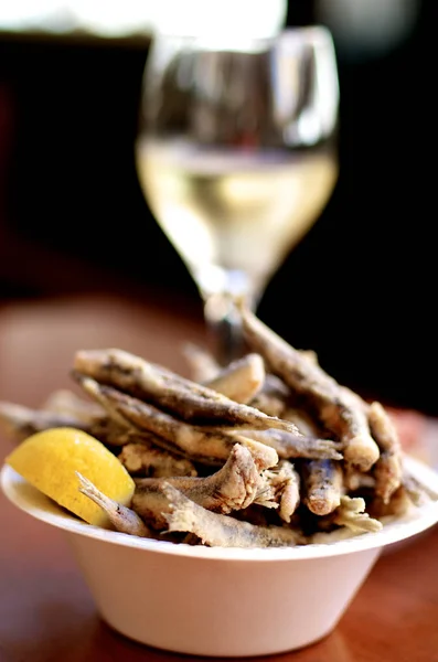 Delicious Crunchy Fried Anchovies Bowl Lemon Blurred Glass White Wine — Stock Photo, Image