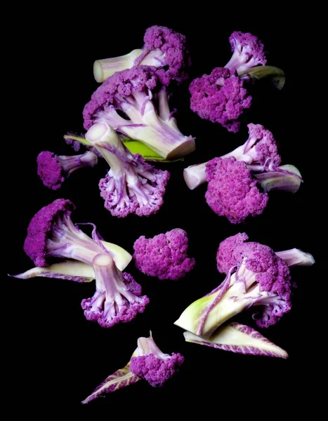 Arrangement Small Sprouts Fresh Raw Purple Cauliflower Leafs Isolated Black — Stock Photo, Image