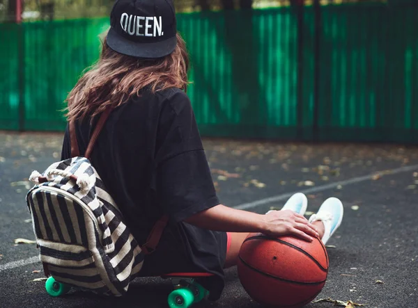 Closeup Photo Basketball Ball Girl Sitting Plastic Orange Penny Shortboard — Stock Photo, Image