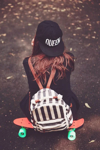 Young Girl Sitting Plastic Orange Penny Shortboard Asphalt Cap — Stock Photo, Image