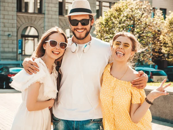 Group Young Three Stylish Friends Posing Street Fashion Man Two Stock Photo  by ©alexhalay 390452500