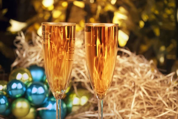 Champagne two glasses gold bokeh