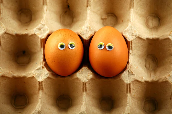 Huevos Ojos Caja Papel —  Fotos de Stock