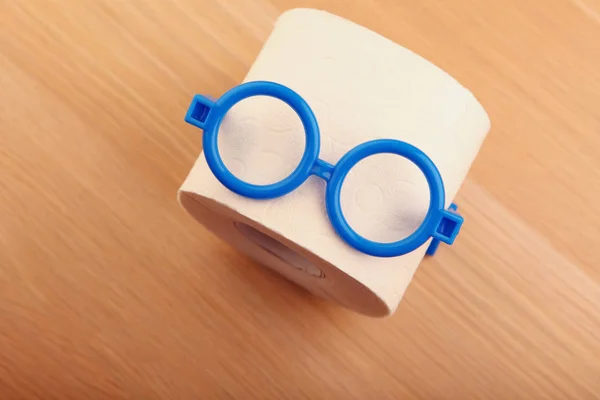 Toilet Paper Blue Plastic Glasses Wooden Table — Stock Photo, Image