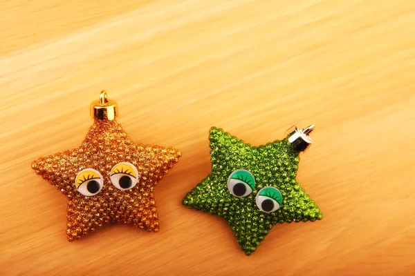 New year toy star eyes wooden sharp table