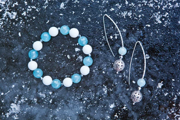Silver Earrings Blue Agate Stone Bracelet Ice Background — Stock Photo, Image