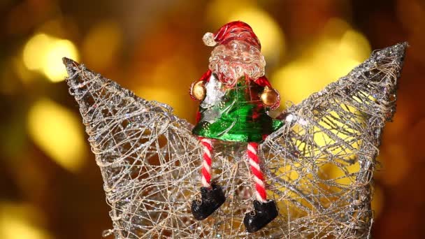 Zabawka Bengalese Santa Claus Świeca Złota Bokeh Materiału Wideo — Wideo stockowe
