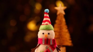 Tekstil kardan adam şekil altın bokeh hd ayak