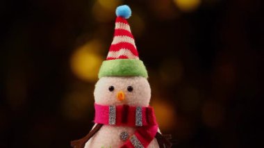 Tekstil kardan adam şekil altın bokeh hd ayak