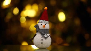 Tekstil kardan adam şekil altın bokeh hd ayak