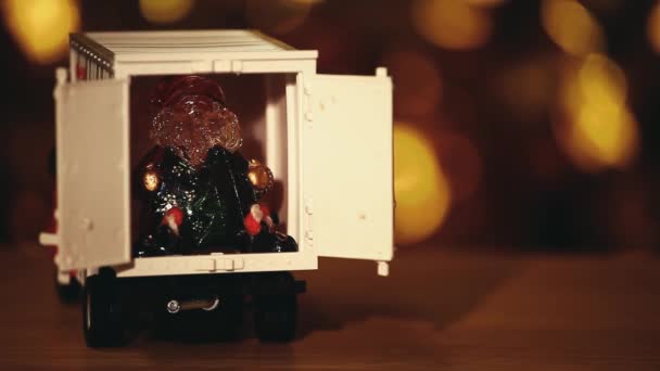 Leksak Bil Santa Claus Träbord Guld Bokeh Film — Stockvideo