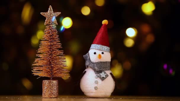 Textile Snowman Figure Gold Bokeh Soap Bubbles Footage — Stock Video