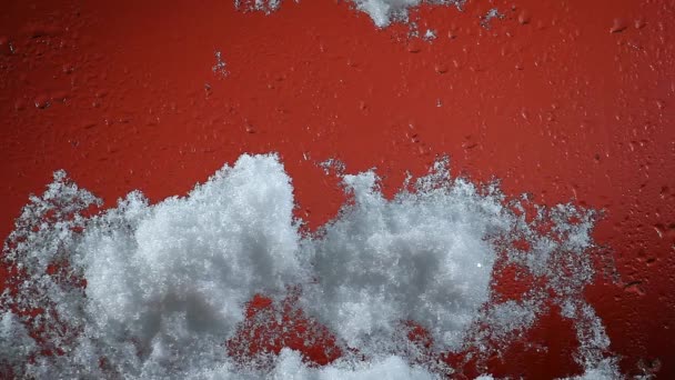 Sníh Červené Pozadí Záběry Skla — Stock video