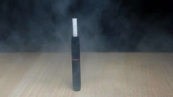 Electronic Smoke Device Table Dark Background Nobody Footage — Stock Video