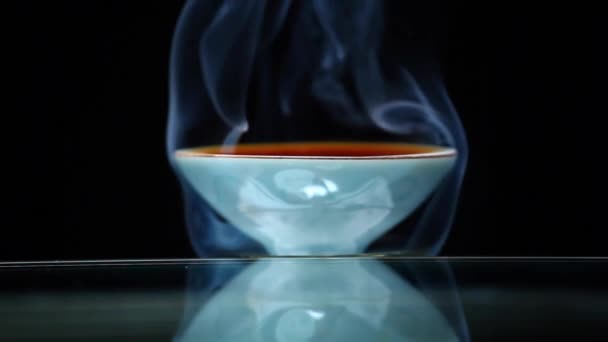 Chinese Black Tea Cup Smoke Dark Background Nobody Footage — Stock Video