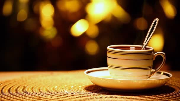 Ένα Ζεστό Τσάι Κύπελλο Χρυσό Κουτάλι Bokeh Κανείς Βίντεο — Αρχείο Βίντεο
