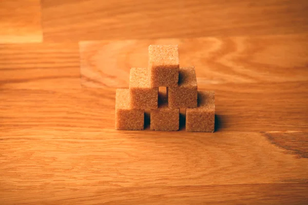 Cane Sugar Blocks Wooden Table — Stock Photo, Image