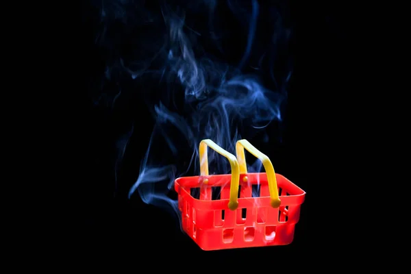 red plastic basket smoke nobody dark background