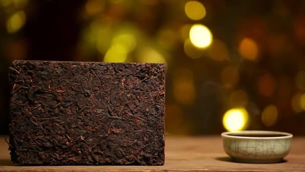 Chiński Czarny Hot Materiału Bokeh Drewniany Stół Gold Cup Herbaty — Wideo stockowe