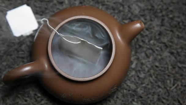 Black Tea Teapot Teabag Smoke Nobody Footage — Stock Video