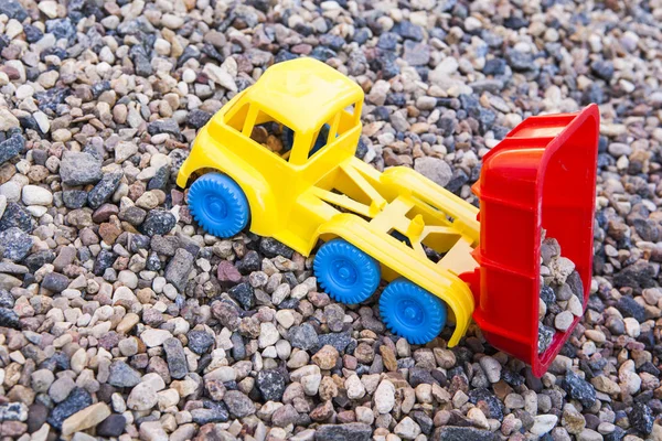 Zabawka Kamień Nikt Plastik Samochód Tło — Zdjęcie stockowe