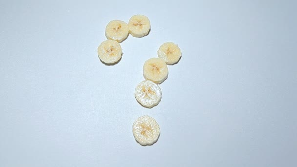 Banana Ponto Interrogação Mão Fundo Branco Imagens — Vídeo de Stock