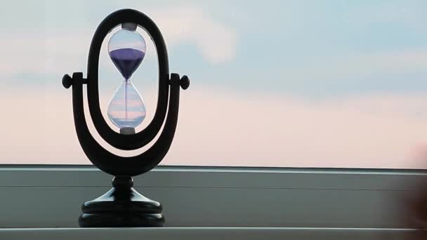 Sunset Sand Clock Hand Window Background — Stock Video