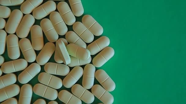 Antibiotikum Tabletta Zöld Papír Háttér — Stock videók