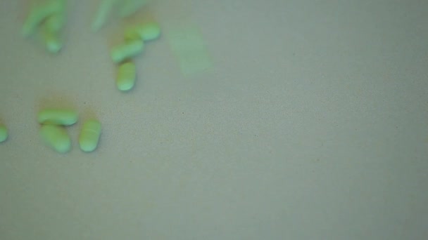 抗生物質錠剤シャープな紙の背景 — ストック動画