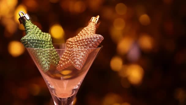 Cocktail Estrela Vidro Bokeh Ouro Imagens — Vídeo de Stock