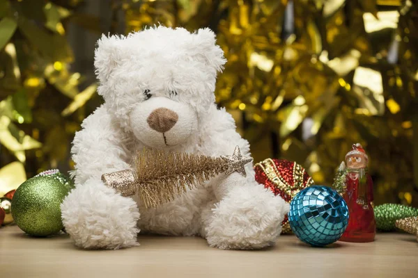 wool bear toy wooden table gold bokeh