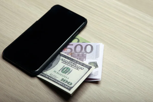 image of mobile phone money